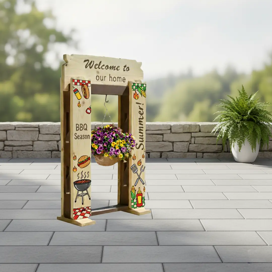 Custom StandCraft Canada display stand decorated for a summer BBQ season theme, featuring grilling illustrations and a 'Welcome to our home' sign.